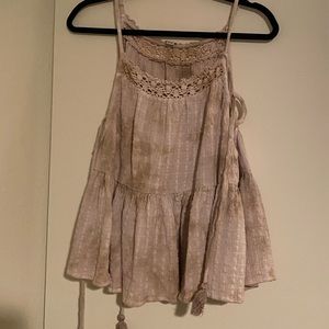 sleeveless tie-dye blouse